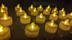 Dwarakesh Enterprises® Pack of 24 Battery Powered high Bright Transparent Wick flammen e-Led Tea Light Candles Ambient Romantic Electric Candles for Wedding Party(3.9 * 3.6 cm)